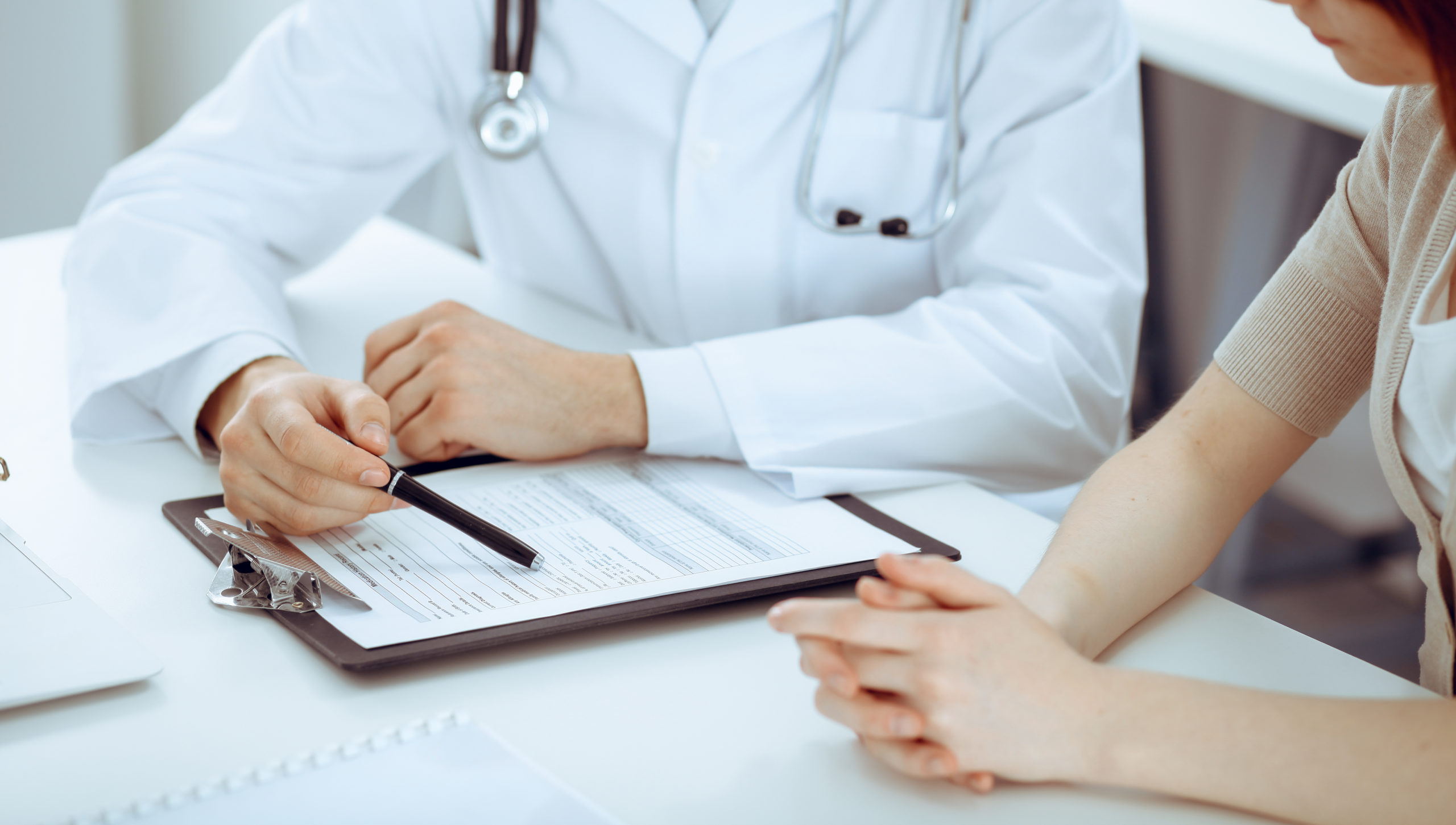 Doctor,Man,And,Patient,Are,Discussing,Something,,Just,Hands,At
